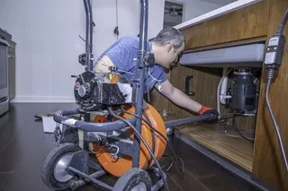 kitchen drain snake machine